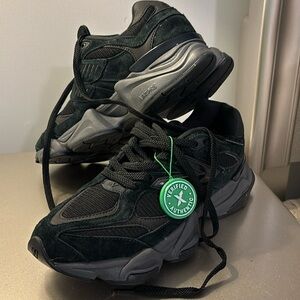 New Balance 9060 Triple Black 8.5 Men/10 Women. New